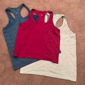 Set of 3 Lululemon tanks sz 10!